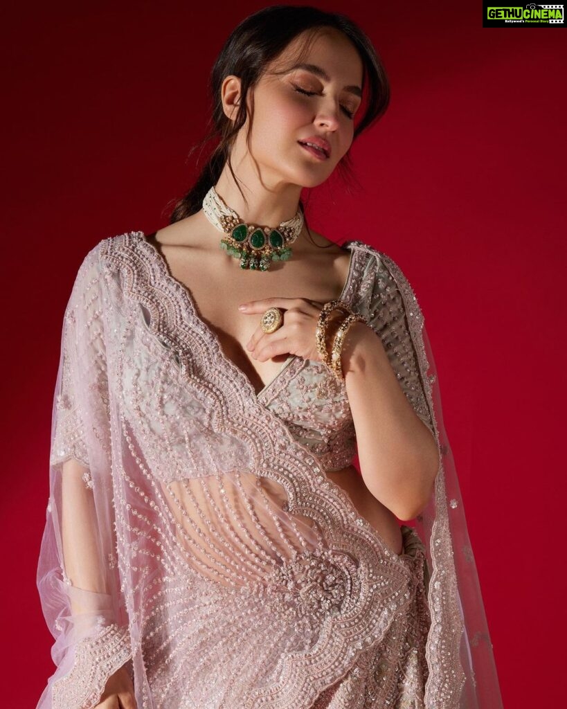 Elli AvrRam Instagram - Sleepy sleepy Cinderella🪄 Presenting @fablookmagazine new year’s special edition. Wearing this bridal collection from @gurusewak_delhi and jewels from @meraki.mumbai Editor & Founder @milliarora7777 @ankkit.chadha2222 Styled by @milliarora7777 Outfit designer @gurusewak_delhi Mua @omkarvardam Hair @Swapnil_makeupnhair Shot by @nikhilshenoyphoto Coordinated by @nadiiaamalik