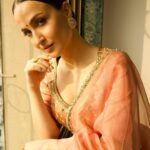 Elli AvrRam Instagram - Be timeless🤍 Saree - @raw_mango Earrings by - @avior.jewels rings by - @kharikajai Styled by- @juhi.ali Photographer - @nikhilshenoyphoto Makeup & Hair by - @jyotii.90 @thakuramit190 #ElliAvrRam #yourstruly