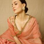 Elli AvrRam Instagram - Sarees have a separate spot in my closet and heart🤍 What about you? Saree - @raw_mango Earrings by - @avior.jewels rings by - @kharikajai Styled by- @juhi.ali Photographer - @nikhilshenoyphoto Makeup & Hair by - @jyotiiadvani.artistry @thakuramit190 #elliavrram #sareelove #desi #fashion #yourstruly
