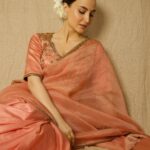 Elli AvrRam Instagram - Sarees have a separate spot in my closet and heart🤍 What about you? Saree - @raw_mango Earrings by - @avior.jewels rings by - @kharikajai Styled by- @juhi.ali Photographer - @nikhilshenoyphoto Makeup & Hair by - @jyotiiadvani.artistry @thakuramit190 #elliavrram #sareelove #desi #fashion #yourstruly