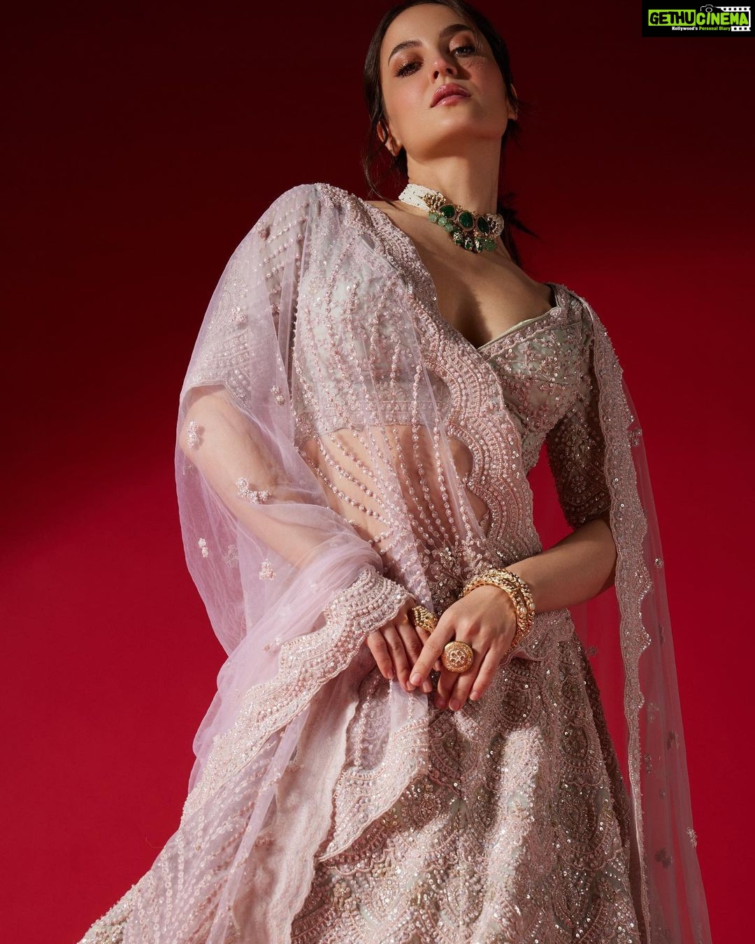 Elli AvrRam Instagram - Sleepy sleepy Cinderella🪄 Presenting @fablookmagazine new year’s special edition. Wearing this bridal collection from @gurusewak_delhi and jewels from @meraki.mumbai Editor & Founder @milliarora7777 @ankkit.chadha2222 Styled by @milliarora7777 Outfit designer @gurusewak_delhi Mua @omkarvardam Hair @Swapnil_makeupnhair Shot by @nikhilshenoyphoto Coordinated by @nadiiaamalik
