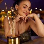 Elli AvrRam Instagram - Grateful for the recognition as: - The Most Popular Versatile Artist in the Media & Entertainment🏆🎭 #moversandshakers #awards #2022 Versatile is what I’ve always wanted to be and to remain, it’s what makes it all so much more fun! Lots of love to all my wonderful fans around the world, my supporters and well wishers, who truly sees me for who I am and what I have to share with the World✨ You are all part of my journey and achievements. And I’m here to inspire you all, to follow your heart and dreams! Put your mind to it and have faith it’ll all come true❤️ Thank you @maacindiaofficial . Photography @nikhilshenoyphoto Hair @gabrielggeorgiou Makeup @ankitamanwanimakeupandhair Dress @studiohimaniarora #ElliAvrRam #yourstruly