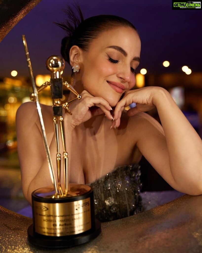 Elli AvrRam Instagram - Grateful for the recognition as: - The Most Popular Versatile Artist in the Media & Entertainment🏆🎭 #moversandshakers #awards #2022 Versatile is what I’ve always wanted to be and to remain, it’s what makes it all so much more fun! Lots of love to all my wonderful fans around the world, my supporters and well wishers, who truly sees me for who I am and what I have to share with the World✨ You are all part of my journey and achievements. And I’m here to inspire you all, to follow your heart and dreams! Put your mind to it and have faith it’ll all come true❤️ Thank you @maacindiaofficial . Photography @nikhilshenoyphoto Hair @gabrielggeorgiou Makeup @ankitamanwanimakeupandhair Dress @studiohimaniarora #ElliAvrRam #yourstruly