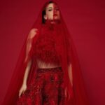 Elli AvrRam Instagram - Your Lady in Red with a new touch✨ New Year’s special edition of @fablookmagazine ✨ Wearing @borahoneys luxury Indian couture. Editor & Founder @milliarora7777 @ankkit.chadha2222 Styled by @milliarora7777 Outfit designer @borahoneys Photographer @nikhilshenoyphoto Mua @omkarvardam Hair @swapnil_makeupnhair Coordinated by @nadiiaamalik