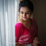 Gopika Anil Instagram - She is stillness, In a world of chaos ! 💕 . Saree -@aathvyavastra 💕 Mua & hair- @abilashchickumakeupartist Pic courtesy - @vysakhvyga_official . #pink #sareelove #pictureoftheday #photoshoot #poses #goethnic #6yardsofelegance #kochidiaries #photography