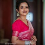 Gopika Anil Instagram - She is stillness, In a world of chaos ! 💕 . Saree -@aathvyavastra 💕 Mua & hair- @abilashchickumakeupartist Pic courtesy - @vysakhvyga_official . #pink #sareelove #pictureoftheday #photoshoot #poses #goethnic #6yardsofelegance #kochidiaries #photography