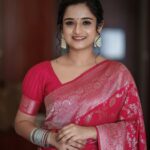 Gopika Anil Instagram - Storm in her eyes, peace in her smile ! ✨💕 Mua n hair @abilashchickumakeupartist Saree @aathvyavastra Pic courtesy @vysakhvyga_official . #pictureoftheday #goethnic #traditional #loveforsaree #pinklove #drapeit #wearit #photoshoot #photography