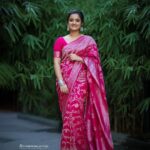 Gopika Anil Instagram - Life is short, let my pallu be long 💕 . Saree - @aathvyavastra Makeup n hair- @abilashchickumakeupartist Pic courtesy- @vysakhvyga_official . #saree #sareelover #longpallu #loveforsarees #pictureoftheday #style #pink #silverzari #sareefashion #photoshoot #photography #traditional