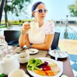 Gul Panag Instagram - Let me start by saying that I’m not a foodie. For those of you, who know me or have followed me, you’ll see that I hardly ever post about food. I eat to live. But all that changed in the last two days spent at @theleelapalaceudaipur . And how! Where does one even begin to describe the experience that the Leela Hotels pride themselves on curating. I could go on and on about the stunning artwork, and architecture, interiors, collection of contemporary art but more about that later. Or about the incredible warmth that is exuded by every single person you come into contact with. Starting with GM, himself! I’m on a very strict food regime prescribed by @sharmashalvi and the signature wellness menu Aujasya - was a great fit-a perfect balance of taste and nutrition with guilt free indulgence. Both Chef Ravish and Roopak crafted the finest food for us. From Pan Asian to authentic Rajasthani food with its robust spices - incredible! On our first evening we dined at the famed Sheesh Mahal ( rated one of the most romantic restaurants in the world by Architectural Digest US and) and enjoyed the incredible food prepared by Chef Roopak and traditional breads made by Neetu ji on a traditional fire. Neetu ji is Palace associate by day and spends time at the restaurant in the evening churning out traditional rotis. The next evening was at the Sheesh Mahal terrace with Chef Ravish curating the most incredible thali ever ( last photo) The resplendent City Palace bedecked by night, the serenity of Lake Pichola coupled with the flavours of Royal Dining made these evening unforgettable! And yes, I’m a certified foodie now. As long as the food is from Aujasya . #leelaudaipur #notjustaroadtrip #theleelapalaceudaipur #palacebythelake #theleela @ravishrmishra Leela Palace, Udaipur