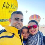Gul Panag Instagram - Full of hot air. Literally. Our second time in Capadoccia. And just as magical. The hot air balloon ride is arguably one of the finest experiences that I’ve ever had. This time around, we had Nihal with us who was mesmerised. Seeing it all over again through his eyes, was an altogether different experience. Since we are here in the middle of summer, the days are very long , with sunrise at 5 AM. The balloon pilots typically take us up a little before so one can witness the sunrise in all its glory. Our pick up was at 3.45 AM. And Nihal was an absolute trooper. In fact, we woke up at 2.30 ( not unusual for Rishi, given his job💁🏻‍♀️,) cup of tea, when Nihal walked into the living room, rubbing his eyes. Hence, proved yet again, there are children will surprise us again and again. Like he did on the trek up to the Tigers’s nest in Bhutan are early this year. #travel #turkey #familytravel #travelgram Cappadocia