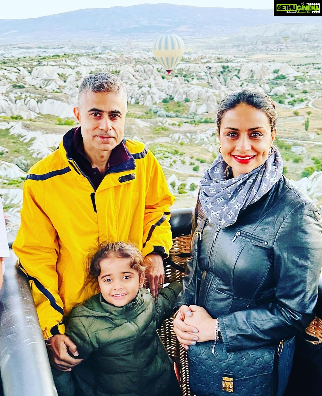 Gul Panag Instagram - Full of hot air. Literally. Our second time in Capadoccia. And just as magical. The hot air balloon ride is arguably one of the finest experiences that I’ve ever had. This time around, we had Nihal with us who was mesmerised. Seeing it all over again through his eyes, was an altogether different experience. Since we are here in the middle of summer, the days are very long , with sunrise at 5 AM. The balloon pilots typically take us up a little before so one can witness the sunrise in all its glory. Our pick up was at 3.45 AM. And Nihal was an absolute trooper. In fact, we woke up at 2.30 ( not unusual for Rishi, given his job💁🏻♀️,) cup of tea, when Nihal walked into the living room, rubbing his eyes. Hence, proved yet again, there are children will surprise us again and again. Like he did on the trek up to the Tigers’s nest in Bhutan are early this year. #travel #turkey #familytravel #travelgram Cappadocia