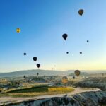 Gul Panag Instagram – Full of hot air. Literally.
Our second time in Capadoccia. And just as magical. The hot air balloon ride is arguably one of the finest experiences that I’ve ever had. This time around, we had Nihal with us who was mesmerised. Seeing it all over again through his eyes, was an altogether different experience.
Since we are here in the middle of summer, the days are very long , with sunrise at 5 AM. The balloon pilots typically take us up a little before so one can witness the sunrise in all its glory. Our pick up was at 3.45 AM. And Nihal was an absolute trooper. In fact, we woke up at 2.30 ( not unusual for Rishi, given his job💁🏻♀️,) cup of tea, when Nihal walked into the living room, rubbing his eyes.
Hence, proved yet again, there are children will surprise us again and again. Like he did on the trek up to the Tigers’s nest in Bhutan are early this year.
#travel #turkey #familytravel #travelgram Cappadocia