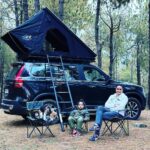 Gul Panag Instagram - Every day is a new experience in the outdoors. And this is Nihal’s favourite part. Camping. From where I come this is actually glampimg, but more on that later ). We first took Nihal camping two years ago when he was 3. I was apprehensive whether he’d take to it. Given that a big part of his parent’s lives revolves around the outdoors and adventure, him not enjoying all those would really have put a spanner in the works. Luckily for us, he took to it like a fish to water! And now given a choice for a weekend break- he will always pick camping. Sometimes asks to go camping in the middle of a school week too! This time we tried a new tent from my friends @nomadadventuresoverland ! And we loved it. So much easier to set up than my older Iron Man tent ( which is faster than a conventional tent that @sherbir and I have grown up pitching - tired , hungry and often in pouring rain) . And equally quick to pack up. Special thanks to our buddies @bimbra4x4 and @taranbimbra for installing it. And a big shout out to my favourites at @mahindraadventure for organising this @mahindra.scorpio.official . We had an amazing weekend amidst the pine trees with clean air , under the stars- thanks to you all.