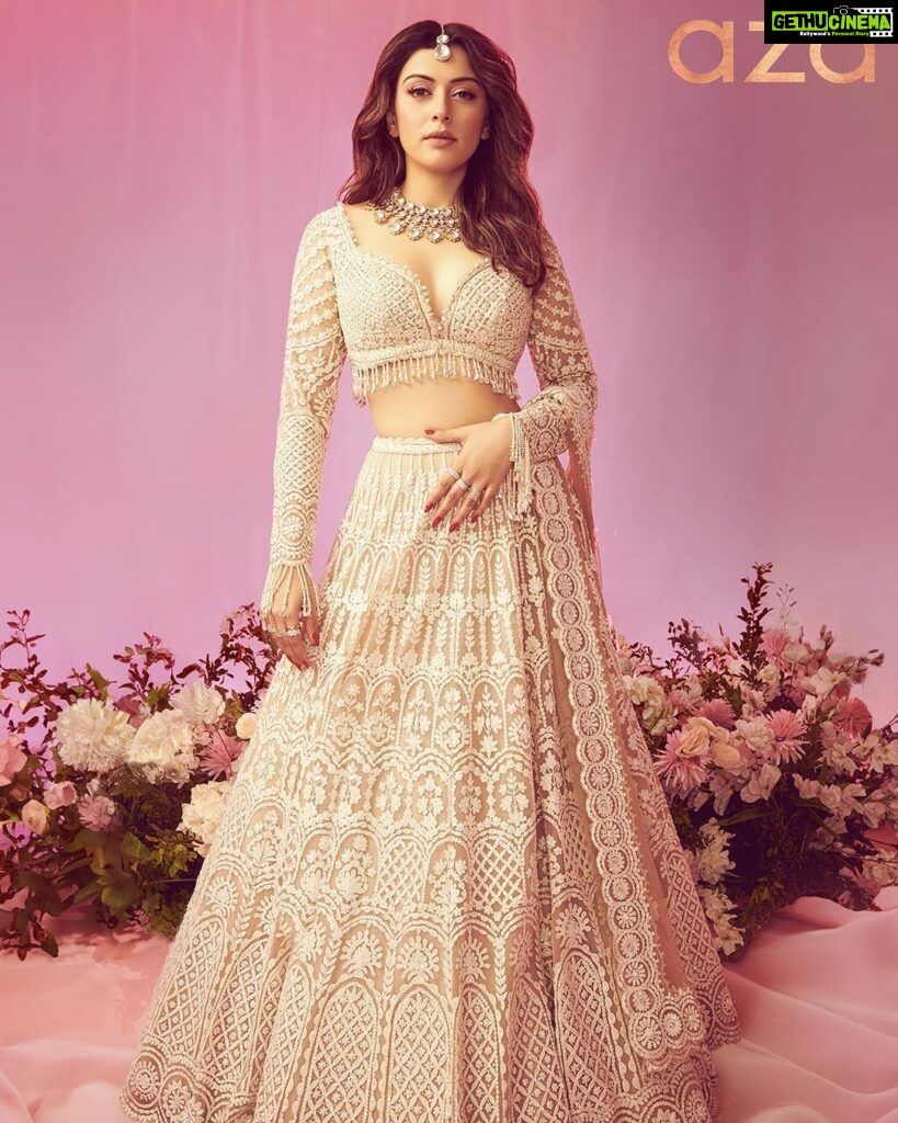 Hansika Motwani Instagram - Presenting @azafashions #CoverStory starring the gorgeous “New Bride” @ihansika. “I always wanted a traditional, very Indian wedding – that was my priority. But I also dreamt of a white ceremony. Eventually, we incorporated both – we did a white-themed Derby event for the mehendi and our pheras were red. So, while the former was designed to look dreamy, the marriage ceremony had a regal vibe to it. For the wedding, both Sohael and I wore stunning custom-made creations by Rimple & Harpreet Narula. My wedding lehenga was the precise red that I wanted and everything I had envisioned it to be.” Get to know #HansikaMotwani in our exclusive #AzaCoverStory interview (link in bio): https://www.azafashions.com/coverstory/hansika-motwani Clothing: @seemagujraldesign Jewellery: @yuvaanjewels; @mortantra; @viviniabyvidhimehra Editor: @devanginishar Photographer: @kunalgupta91 Interview: @sreemita_bhattacharya Creative Direction: @amedithi Styled by : @sukritigrover Styling assistants: @vanigupta.23 @simrankumar19 Styling intern: @mahek_gada Makeup by: @makeupbyurmikaur Hairstyling by: @tinamukharjee PR Consultant @ThinkTalkies #Azafashions #aza #hansika #seemagujral #indianwedding #lehenga #celebrity #celebritystyle