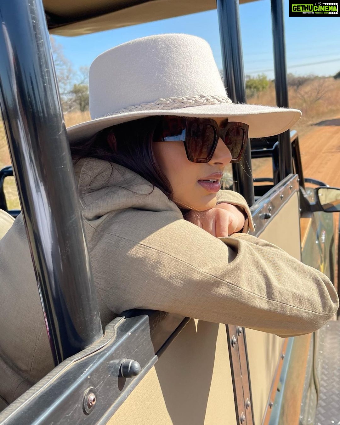 Harnaaz Kaur Sandhu Instagram - Do not try to fight a lion if you are not one yourself. @missuniverse @golden_impalas_bush_resort Styled by @meemmap Jacket vintage Top and pants @wightelephant Boots @dsw Makeup @reneedewitmakeupartist South Africa