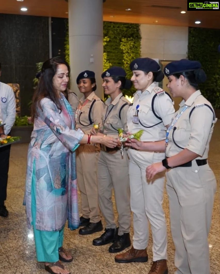Hema Malini Instagram - I would like to congratulate the Ministry of Civil Aviation & DG BCAS for initiating the Aviation Security Culture Week across India with an endeavor to raise awareness on Aviation security with a commitment to make air travel safe for all. Thank you CISF and the entire team of Security professionals at Mumbai International Airport, for making our journey safe and secure. Remember, Security is everyone’s responsibility - See it. Say it. Secure it. I would also like to thank CISF and Airline security staff who were assembled (20-30 staff) on my way, post security and I appreciate their efforts in making Air travel safe and secure at Mumbai Airport.@csmia_official for Mumbai Airport @MOCA for Ministry of Civil Aviation @moca_goi #securityculturalweek #mumbaiaviation #mumbaiinternationalairport