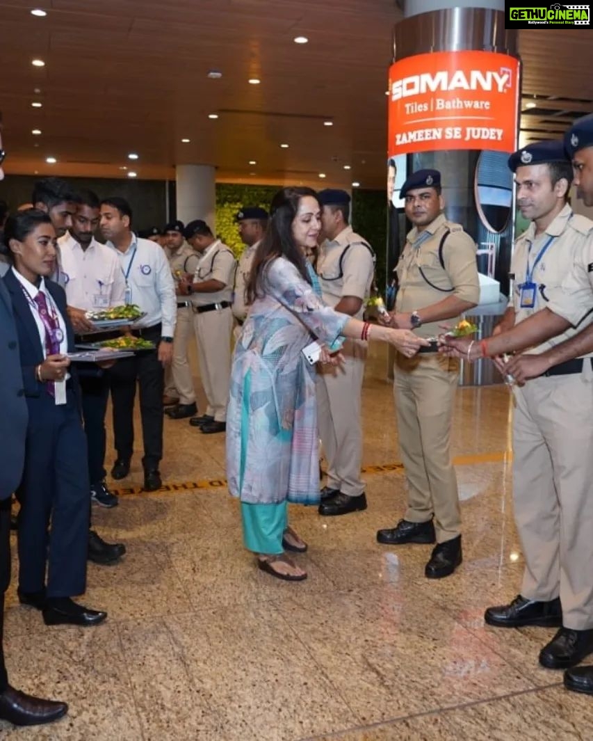 Hema Malini Instagram - I would like to congratulate the Ministry of Civil Aviation & DG BCAS for initiating the Aviation Security Culture Week across India with an endeavor to raise awareness on Aviation security with a commitment to make air travel safe for all. Thank you CISF and the entire team of Security professionals at Mumbai International Airport, for making our journey safe and secure. Remember, Security is everyone’s responsibility - See it. Say it. Secure it. I would also like to thank CISF and Airline security staff who were assembled (20-30 staff) on my way, post security and I appreciate their efforts in making Air travel safe and secure at Mumbai Airport.@csmia_official for Mumbai Airport @MOCA for Ministry of Civil Aviation @moca_goi #securityculturalweek #mumbaiaviation #mumbaiinternationalairport
