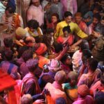 Hema Malini Instagram - On the joyous occasion of Holi I celebrated the festival of colours in the traditional Braj style at the Radha Raman Temple along with all the Brijwasis and also released my latest Bhajan "Shyam rang mein mai to rang gayi..." produced by Kavi Narayan Agarwal with music by Vivek Prakash. Also present at the event was Vaishnavacharya Shri. Abhishek Goswami Ji. #happyholi2023 #holi #celebration #festival #mathura #vrindavan #radharamantemple #bhajan #narayanagarwal #vivekprakash