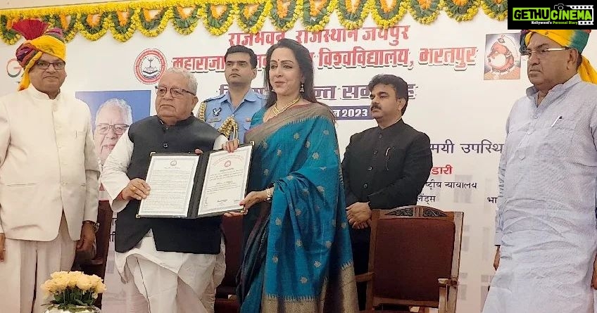 Hema Malini Instagram - I was awarded an honorary Doctorate yday by the Maharaja Surajmal Brij University, Bharatpur, Rajasthan. Present on the occasion were Shri. Rajendra Yadav, Hon'ble MoS, Dept of Higher Education, Govt of Rajasthan, HM, Shri. Kalraj Mishra Ji, Hon'ble Governor of Rajasthan, Hon'ble Minister for Higher Education, Rajasthan Government, Dr. Dalveer Bhandari , Hon'ble Justice at the International Court of Justice, Hague, Netherlands, Professor Ramesh Chandra, Vice-Chancellor, Maharaja Soorajmal Brij University, Bharatpur. #doctorate #honorarydoctorate