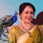 Hema Malini Instagram - A small interesting fashion show was arranged with models wearing lovely lehengas with the Vrindavan theme prints. I too wore a saree with the same theme & it was a runaway hit! #vrindavan #fashionshow
