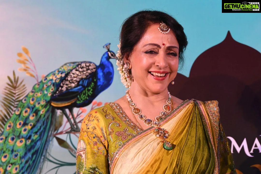 Hema Malini Instagram - A small interesting fashion show was arranged with models wearing lovely lehengas with the Vrindavan theme prints. I too wore a saree with the same theme & it was a runaway hit! #vrindavan #fashionshow