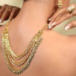 Hitha Chandrashekar Instagram - Awaken the royal in you and give the world something to stare at, dodging convention in style like @thehithaceee as she puts on a multi-stringed set, in a whole new style! Of course, you’ve seen this set before from @arjunaa_jewellers on Hitha - but a lot of people wanted a closer look at the piece and the styling - so here it is! #accuracyindesign #handmadejewellery #intricate #beauty #finesse #exquisite #gems #stones #goldjewellery #diamonds #victorianstyle #regal #bestjewellery #seasonoflove #jewellerylove #majestic #royal #jewelleryoftheday #blingbling #arjunaa #instajewellery #jewels #fashion #style #trend #glam #bangalore #weddingseason