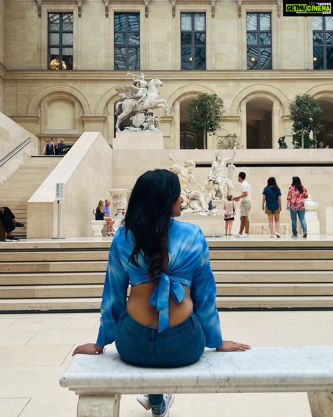 Janani Ashok Kumar Instagram - The Louvre, or the Louvre Museum, is a national art museum in Paris, France. A central landmark of the city, it is located on the Right Bank of the Seine in the city's 1st arrondissement and home to some of the most canonical works of Western art, including the Mona Lisa and the Venus de Milo. - One day wonโt be sufficient to look at the magnificent work of arts all around this museum ๐ซ Watch the space for some beautiful arts I captured ๐๐ผ - ๐ธ: @madhumitha_sivasankar #louvremuseum #louvre #louvrepyramid #louvreparis #paris #parisfrance #love #travel #traveltheworld Louvre Museum Paris France
