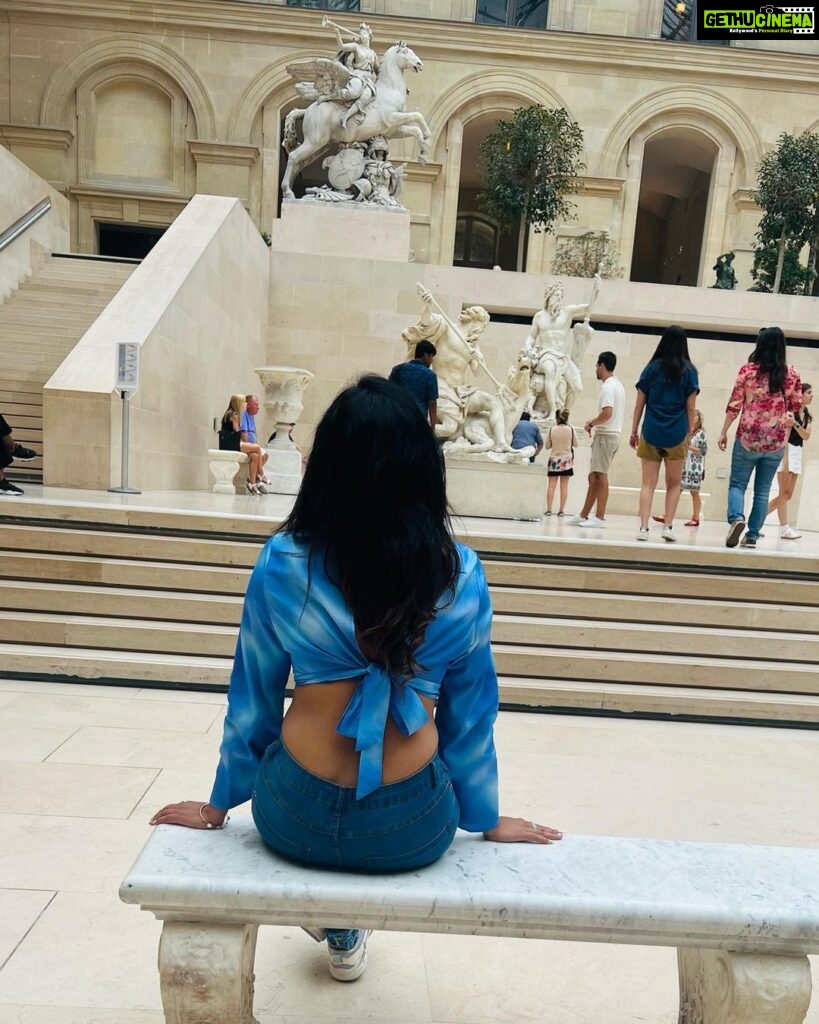 Janani Ashok Kumar Instagram - The Louvre, or the Louvre Museum, is a national art museum in Paris, France. A central landmark of the city, it is located on the Right Bank of the Seine in the city's 1st arrondissement and home to some of the most canonical works of Western art, including the Mona Lisa and the Venus de Milo. - One day won’t be sufficient to look at the magnificent work of arts all around this museum 🫠 Watch the space for some beautiful arts I captured 🙌🏼 - 📸: @madhumitha_sivasankar #louvremuseum #louvre #louvrepyramid #louvreparis #paris #parisfrance #love #travel #traveltheworld Louvre Museum Paris France