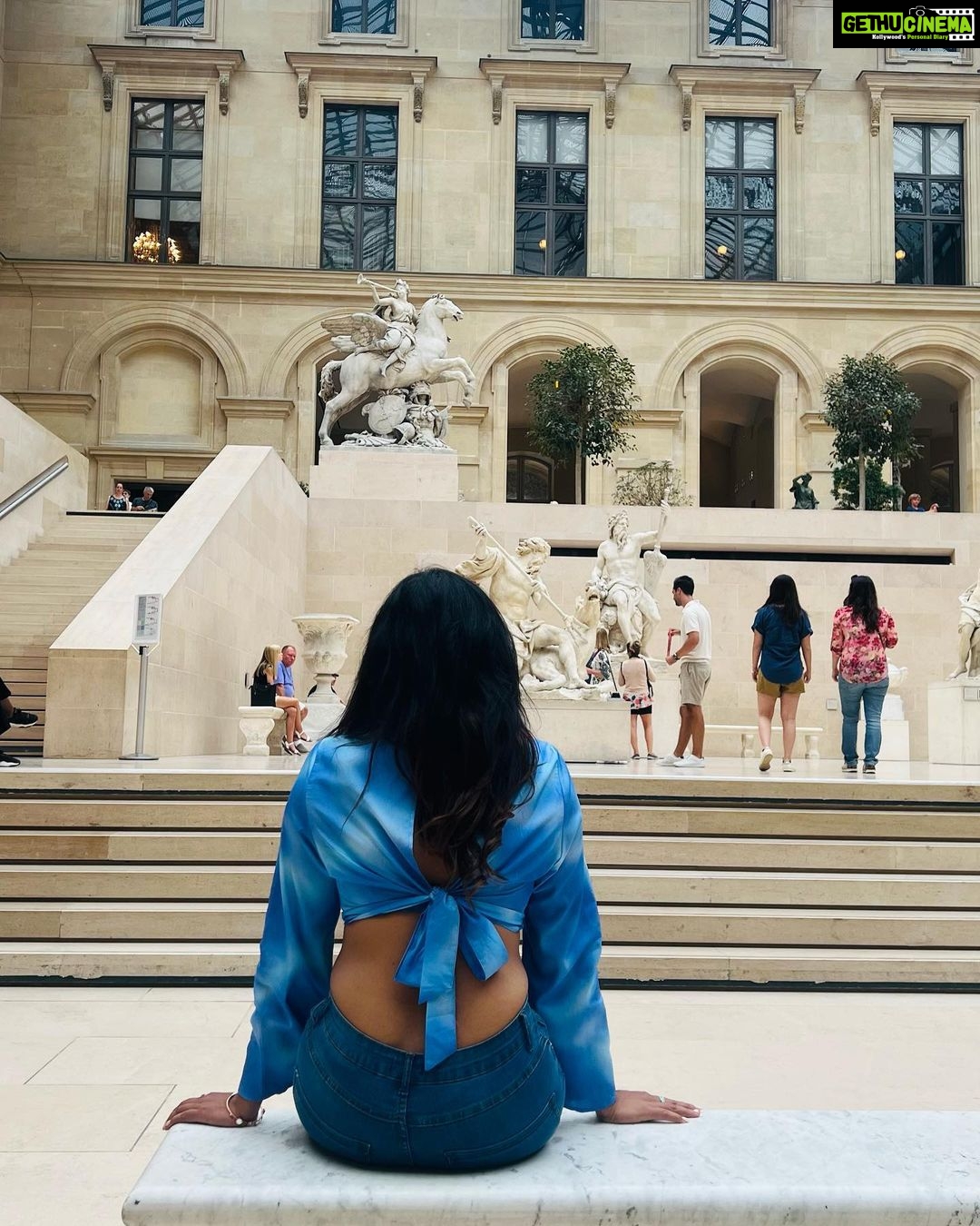 Janani Ashok Kumar Instagram - The Louvre, or the Louvre Museum, is a national art museum in Paris, France. A central landmark of the city, it is located on the Right Bank of the Seine in the city's 1st arrondissement and home to some of the most canonical works of Western art, including the Mona Lisa and the Venus de Milo. - One day wonโt be sufficient to look at the magnificent work of arts all around this museum ๐ซ Watch the space for some beautiful arts I captured ๐๐ผ - ๐ธ: @madhumitha_sivasankar #louvremuseum #louvre #louvrepyramid #louvreparis #paris #parisfrance #love #travel #traveltheworld Louvre Museum Paris France