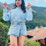 Janani Ashok Kumar Instagram - Life is a series of thousand little miracles, just notice them & feel them while it lasts…! ✨💫💯☃️ 🦋 - 📸: @madhumitha_sivasankar Denim skirt : @zara Sweater: @hm Sunglass: @moschino 👟: @puma #livinginthemoment Lake Brienz, Switzerland