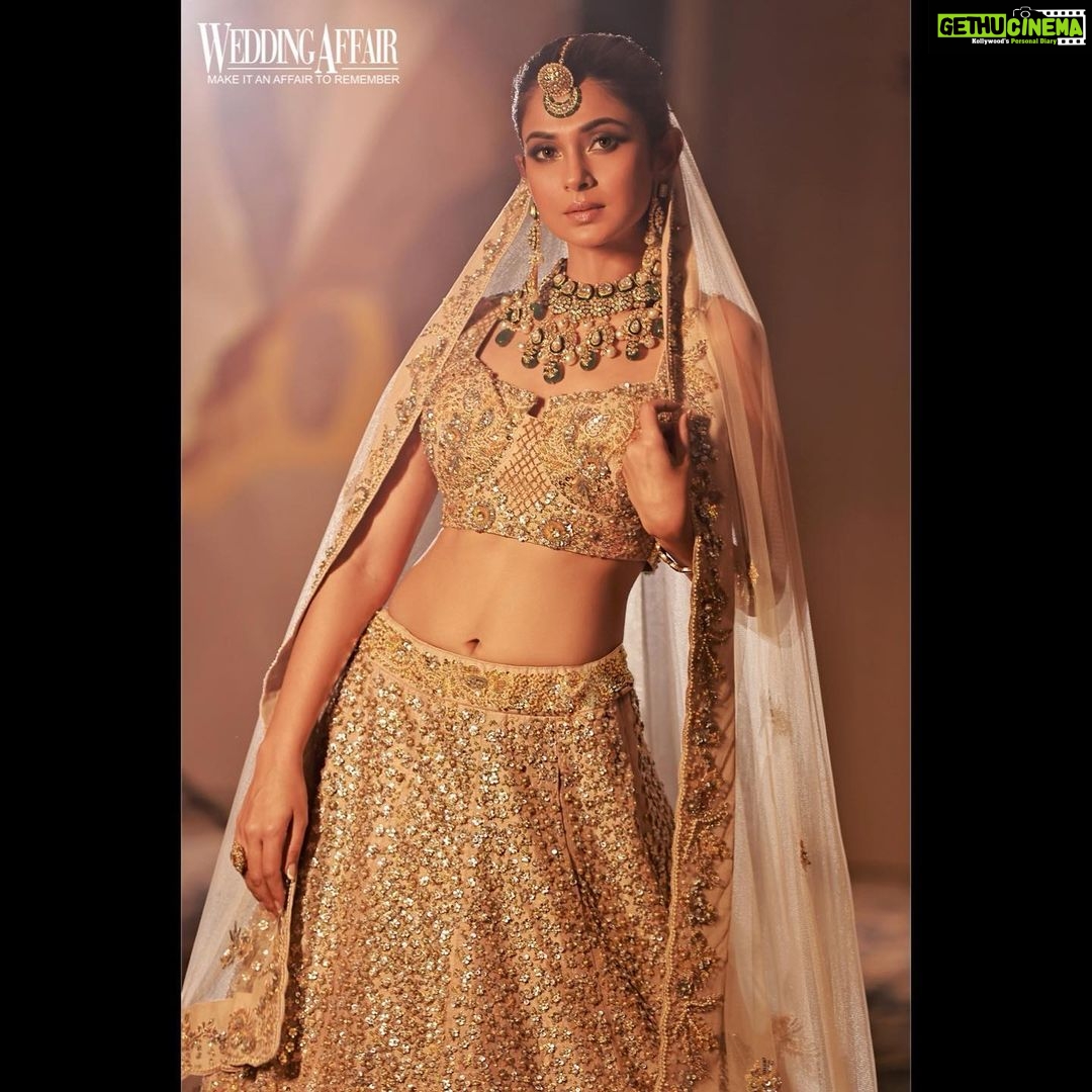Jennifer Winget Instagram - From Haldi to Sangeet, cocktail to reception; I seem to have got myself a whole wedding album without even having a wedding! Well, atleast I had that steamy βπ’π§π§π’πͺπ³β π Magazine: @weddingaffairofficial Cover star: @jenniferwinget1 Photographer: @amitkhannaphotography Stylist: @juhi.ali Hair and Make-up: @rishinaacharya HMU assistant @raashikashetty Location: @novotelmumbaiairport Artist Managed by: @simmerouquai Co-ordinated by: @nadiiaamalik Wardrobe Blue Lehenga: @theroyaleum Jewellery: @rubans.in Gold Lehenga: @studio.mikukumar Jewellery: @tvishajewlz Saree: @kalkifashion Jewellery: @rubans.in Rings: @h.ajoomal Sharara: @labeld Jewellery: @rubans.in Ring: @anthajewels Gown: @nourbyneharika Jewellery: @limelightdiamonds