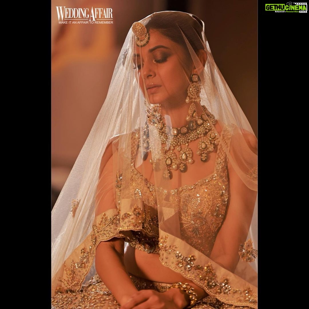 Jennifer Winget Instagram - From Haldi to Sangeet, cocktail to reception; I seem to have got myself a whole wedding album without even having a wedding! Well, atleast I had that steamy βπ’π§π§π’πͺπ³β π Magazine: @weddingaffairofficial Cover star: @jenniferwinget1 Photographer: @amitkhannaphotography Stylist: @juhi.ali Hair and Make-up: @rishinaacharya HMU assistant @raashikashetty Location: @novotelmumbaiairport Artist Managed by: @simmerouquai Co-ordinated by: @nadiiaamalik Wardrobe Blue Lehenga: @theroyaleum Jewellery: @rubans.in Gold Lehenga: @studio.mikukumar Jewellery: @tvishajewlz Saree: @kalkifashion Jewellery: @rubans.in Rings: @h.ajoomal Sharara: @labeld Jewellery: @rubans.in Ring: @anthajewels Gown: @nourbyneharika Jewellery: @limelightdiamonds