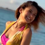 Jennifer Winget Instagram - She beats to the beauty of her wildflower heart and seashore soul 🌼🍃🪸🌊🐚🕊️