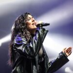 Jonita Gandhi Instagram - It's a 🟤 world... Styled by @jaineeebheda in a @freakinsindia trench for @wirelessfestme Photos by @gltch.in @obpanakal Abu Dhabi, U.A.E.