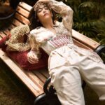 Jonita Gandhi Instagram – Nap time 😴 

For: @thecandymag
Creative Director: @farrahkader
Photographed by: @shreyansdungarwal
Styling by: @style_tubbies
Makeup & Hair Artist: @kanika_arrora
Assistant stylist: @vipulalala
Words by: @tanishka.juneja
Location: @grandhyattmumbai
Artist PR: @kushprbrand
Alliance partner: @volokal

Wearing 
Alberta Printed Satin Shirt: @labelritukumar
Mom Jeans: @onlyindia
Cowrie Under Bust Corset: @nidzign
Tropical in The Wood Choker: @houseofdoro
Strappy Heel Sandals : @heelandbucklelondon