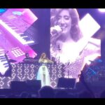 Jonita Gandhi Instagram – Nothing like jammin’ out to one of your favourite @arrahman tunes on stage WITH THE MAN HIMSELF in your own city!!! Toronto ♥️🇨🇦

Sending hugs to those of you who saw me performing songs like this on karaoke around the GTA when I was like 16 lol 👀… Let me know if you want more live performance clips!!! Found this one cuz my dad randomly sent it (shoutout papa @deepakgandhi_sargamstudio brap brappp)

@btosproductions @ranjitbarot1 🔥
#rangeela #yaayire #arrahman Scotiabank Arena