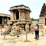 Lahari Shari Instagram - Standing here beside the majestic Stone Chariot, I can't help but feel like a character in an epic drama. This is the very image that graces the Indian currency of INR 50, and I'm standing right beside it! It's like I've been transported back in time to witness a grand spectacle. Truly an awe-inspiring moment at Hampi.😇 #Hampi #StoneChariot #IndianCurrency #INR50 #historybuff #indianheritage #dramaticvibes #feelingblessed #greatfulheart Stone Chariot, Hampi