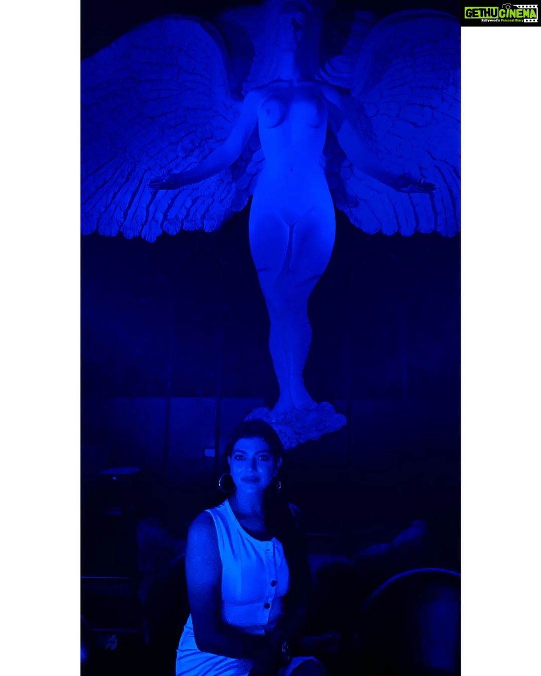 Lahari Shari Instagram - Last night was pure magic ✨ Can't get over the blue light at @lpkwaterfront in Goa! Sitting in front of a beautiful statue of a lady with wings to fly made me feel like anything was possible. Can't wait to see where my adventures take me next! #Goa #TravelGoals #WingsToFly #BeachLife #PureMagic #MagicalNights #ExcitementOverload Lpk Waterfront Supernight Club