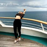 Lahari Shari Instagram - 🌊 Rise and shine! Starting my day with a refreshing stretch on this beautiful cruise, breathtakingly view, Morning bliss on the seas, with arms wide open, my invigorating morning routine! 🙆‍♀ 🌅 There's something magical about the sea breeze and the sound of waves. 💫 Stretching in the morning not just about waking up my body, but also about embracing the beauty that surrounds me, gets my blood flowing and releases my stress. 😌 It's just one piece of my holistic morning routine to boost my health and flexibility. 💪🧘‍♂ 🌞 I sail through life on this incredible cruise. ⛵ I greet the morning sun ☀ #GoodMorning #MorningStretch #FeelTheFlow #HealthyHabits #FlexibilityGoals #Seascape #CruiseLife #SunriseVibes #MorningBliss #SeasideStretch #WellnessJourney #ImOnABoat #SailingThroughLife #EmbraceTheBeauty #HealthyLiving #Selfcare #SeasideBliss #RiseAndShine #HealthyHabits