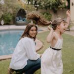 Lisa Ray Instagram - It has been a good summer. Thanks to my gal @by.ushma for finding the moments. Best photographer around! Thanks @makeupbymaitreyi and @thefirstfeather for Sufi and Soleil’s sweet dresses 👗 Dubai, UAE