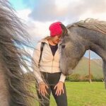Manjari Fadnnis Instagram - 🐴😍❤️🫶🏻 That’s Eggie. Spending time with these lovely horses of Kylemore Abbey was one of my highlights of my trip to Ireland in September 2022. One of the reasons I love travelling solo is the fact that it gives me a chance to connect with the locals, living the life at the places I visit. & because I make friends easily while I travel I get to experience their way of life too. This experience of spending time with these lovely horses running wild in the ranch on open fields happily without being contained in small stables wouldn’t have been possible, had i not met these lovely bunch of people I made friends with over a pool game at this pub called Moley’s at Letterfrack, Connemara. One of them who took care of these lovely beings offered to make me meet these horses of Kylemore Abbey. & there! I got a moment I’ll cherish forever. Thanks @fiachramac for capturing the moment.🤗 #solo #solotravel #ireland #travel #traveldiaries #horses #horsesofinstagram #connemarapony #connemara