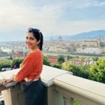 Milana Nagaraj Instagram - A day in Florence🧡 1. In the streets of Florence 2. City view from Piazzale Michelangelo 3. Tired, wondering what to eat😜 4. Pitti Palace 5. Selfie with darling! 6. Stunning View of Florence from Giottos bell tower 7. Basilica of Santha Croce #italy #florence #travel2023 #milananagaraj Florence, Italy