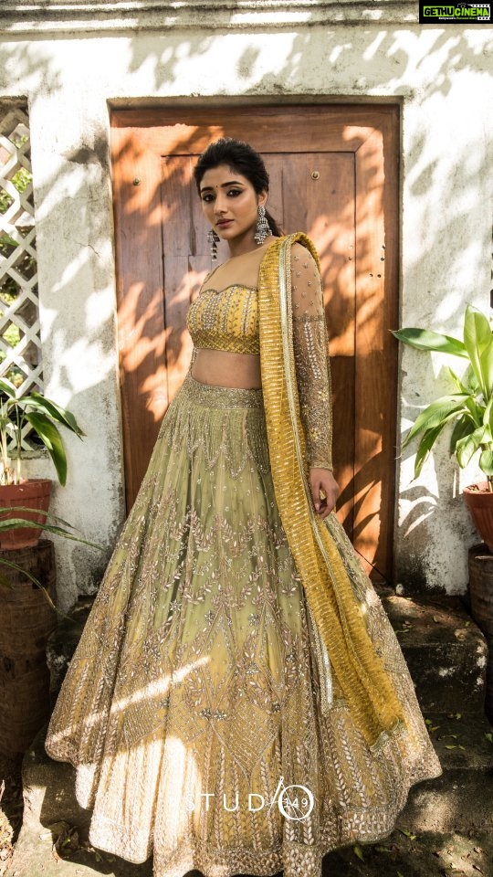 Mirna Menon Instagram - A dream come true mustard and green lehenga, A hand embroidery gradient skirt paired with a matching mustard blouse and an embellished sheer dupatta. Enriched with gota embroidery, this lehenga is a stand out beauty. Featuring @mirnaaofficial Shot by @hariz_comrade Hair and make up @chisellemakeupandhair Jewellery @mspinkpantherjewel Outfit @studio149 #studio149 #embroidery #embroiderylove #weddingwear #weddingfashion #weddingaesthetic #bridal #bridalstyle #bridalfashion #aesthetic #bridallook #bridallehenga #designerlehenga #lehenga #receptionlook