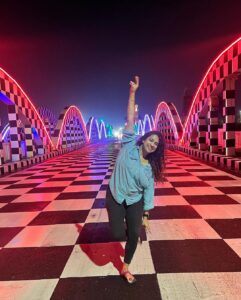 Misha Ghoshal Instagram - The inner child in me got way too excited seeing this bridge 🥺❤️ pure love and joy #colors #lighting #nightlife #chennai #bridge #marinabeach Napier Bridge, Marina Beach , Chennai