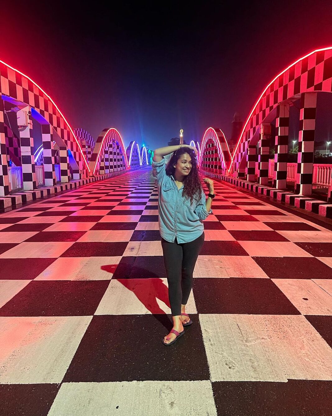 Misha Ghoshal Instagram - The inner child in me got way too excited seeing this bridge 🥺❤️ pure love and joy #colors #lighting #nightlife #chennai #bridge #marinabeach Napier Bridge, Marina Beach , Chennai