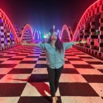 Misha Ghoshal Instagram - The inner child in me got way too excited seeing this bridge 🥺❤️ pure love and joy #colors #lighting #nightlife #chennai #bridge #marinabeach Napier Bridge, Marina Beach , Chennai
