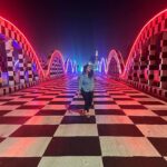 Misha Ghoshal Instagram - The inner child in me got way too excited seeing this bridge 🥺❤️ pure love and joy #colors #lighting #nightlife #chennai #bridge #marinabeach Napier Bridge, Marina Beach , Chennai
