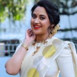 Miya George Instagram - Vishu vibe continues 🌼 Happy Vishu Mua @femy_antony__ Saree @ar_handlooms_kuthampully Jewelry @ezerjewellery Clicks @abinprasad_cherthala Styling @sabarinathk_