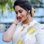Miya George Instagram - Vishu vibe continues 🌼 Happy Vishu Mua @femy_antony__ Saree @ar_handlooms_kuthampully Jewelry @ezerjewellery Clicks @abinprasad_cherthala Styling @sabarinathk_