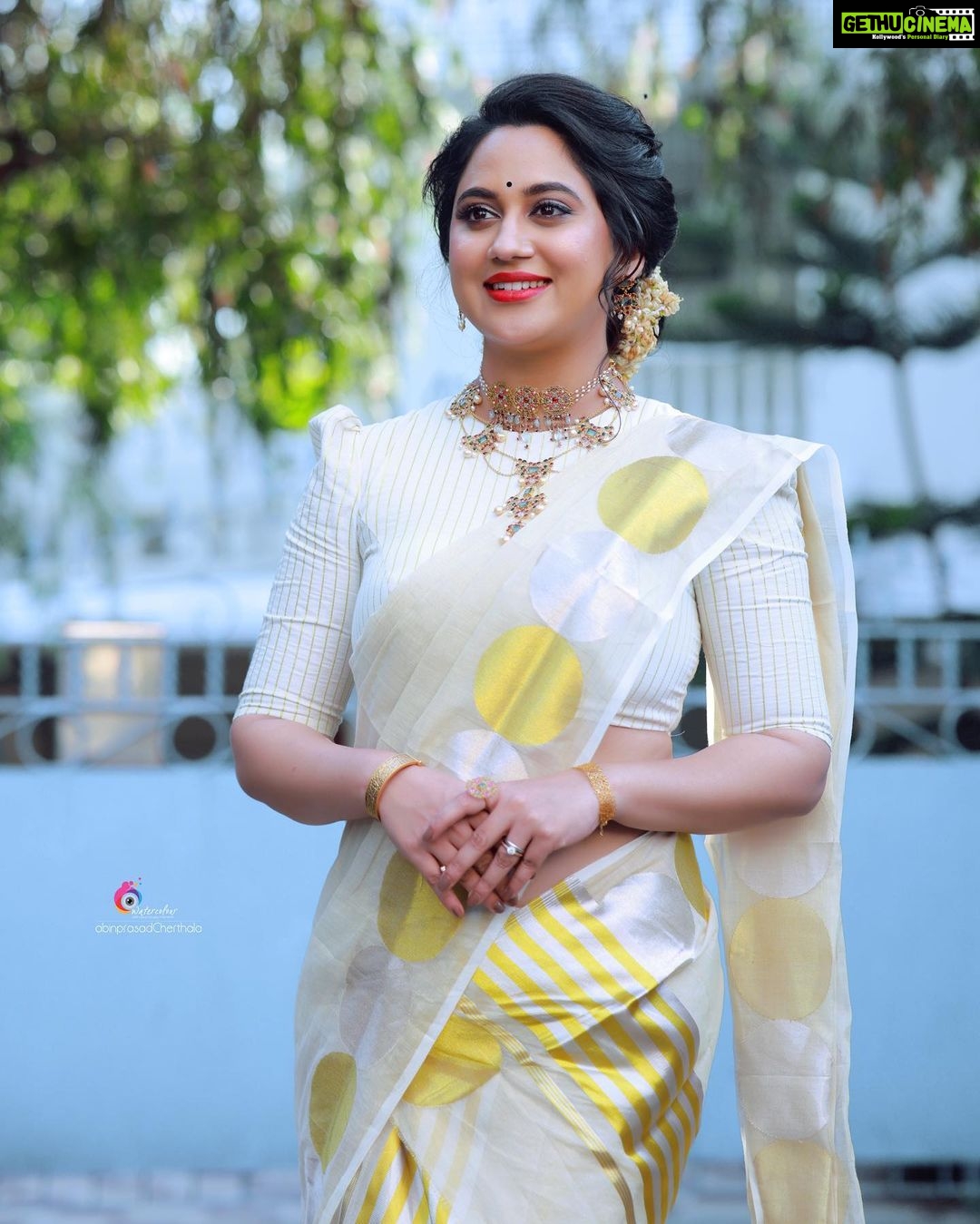 Miya George Instagram - Vishu vibe continues 🌼 Happy Vishu Mua @femy_antony__ Saree @ar_handlooms_kuthampully Jewelry @ezerjewellery Clicks @abinprasad_cherthala Styling @sabarinathk_